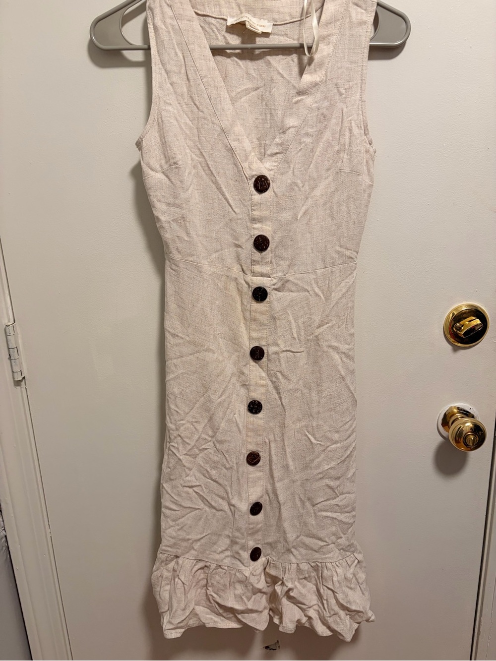 Sleeveless Button-Front Midi Dress in Cream with Ruffle Hem